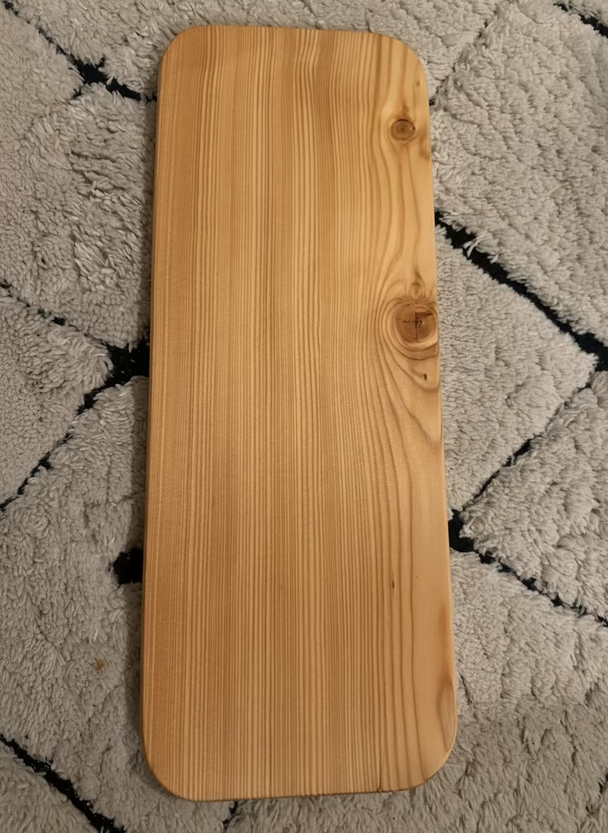 Planche artisanale en mélèze – fabriquée à la main