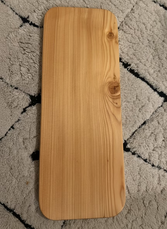 Planche artisanale en mélèze – fabriquée à la main